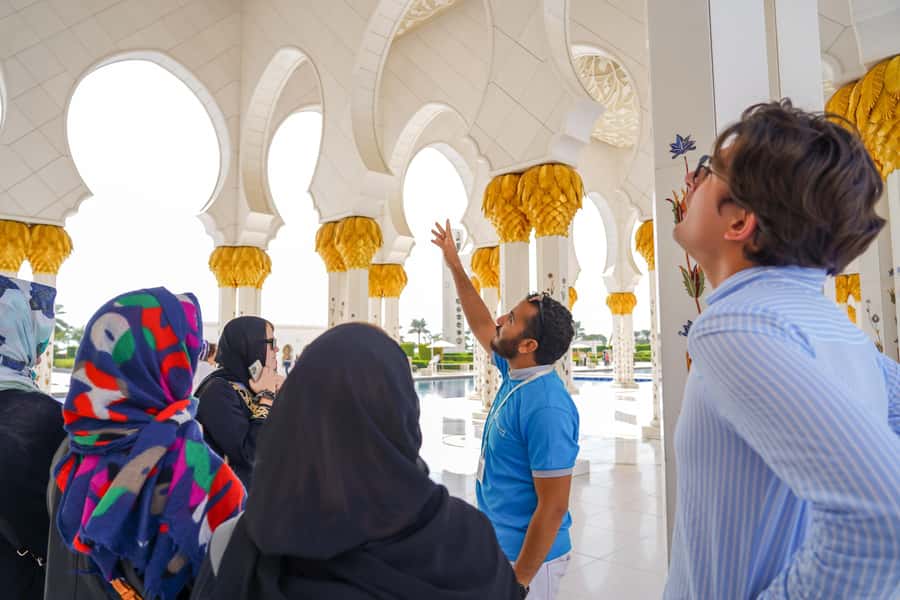 From Abu Dhabi: City Tour with Grand Mosque & Louvre Museum - Sheikh Zayed Grand Mosque: White Stone, Hand Craft, and Rules That Help