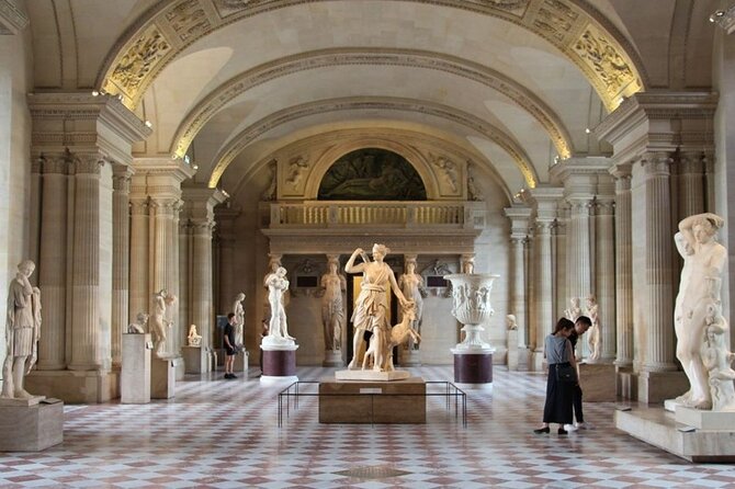 Guided tour of the Louvre Museum with tickets included - Finding the Group at Le Café Marly on Rue de Rivoli
