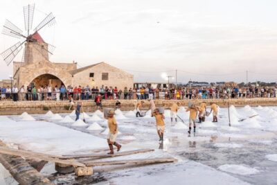 Guided tour of the Trapani Salt Pans and Salt Museum - Part 1: The Salina Culcasi walk where you see pink pools, gray clay, and salt under your hands
