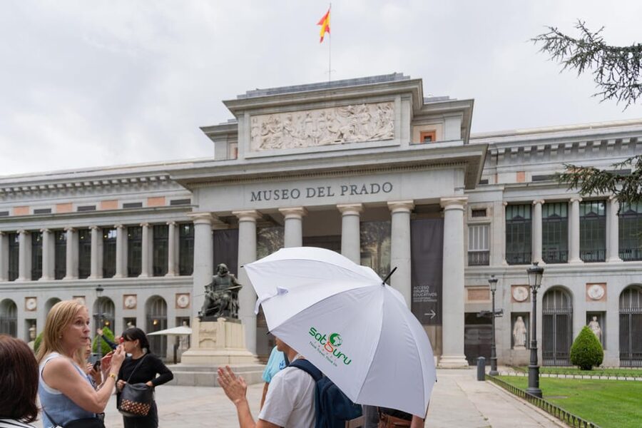 Madrid: Reina Sofia and Prado Museum Tickets and Guided Tour - Start at the Reina Sofía: find the white umbrella
