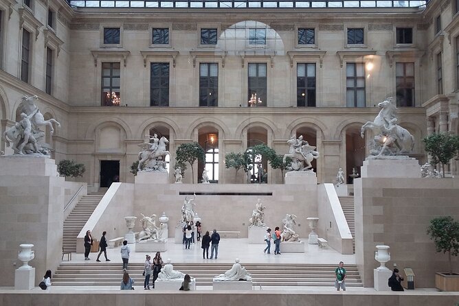 Paris: Louvre Museum Tour Mona Lisa & Iconic Masterpieces - Meeting at Kiosque des Noctambules and Getting Through the Louvre Fast