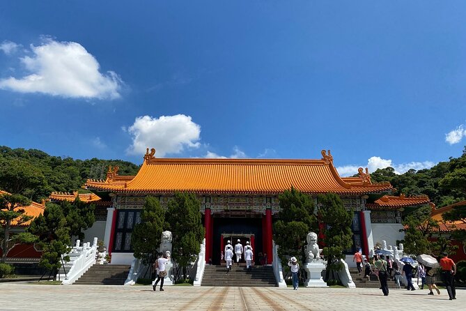 Taipei City Morning Tour with National Palace Museum entry - Longshan Temple built in 1738: where daily belief shows
