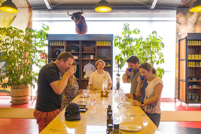 Visit Oil Mill Museum and Olive Oil Tasting in Ronda - Stepping into LA Organic: art, photos, and olive country