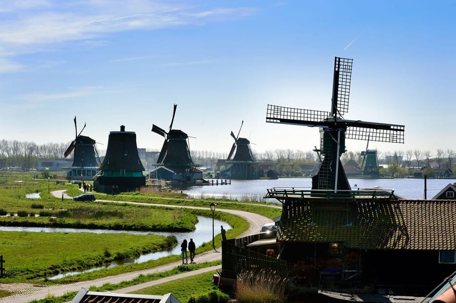 Zaanse Schans: Windmill & Museum Entry Ticket w/ Audio Guide - Walking the village lanes for functional windmills and real photo time
